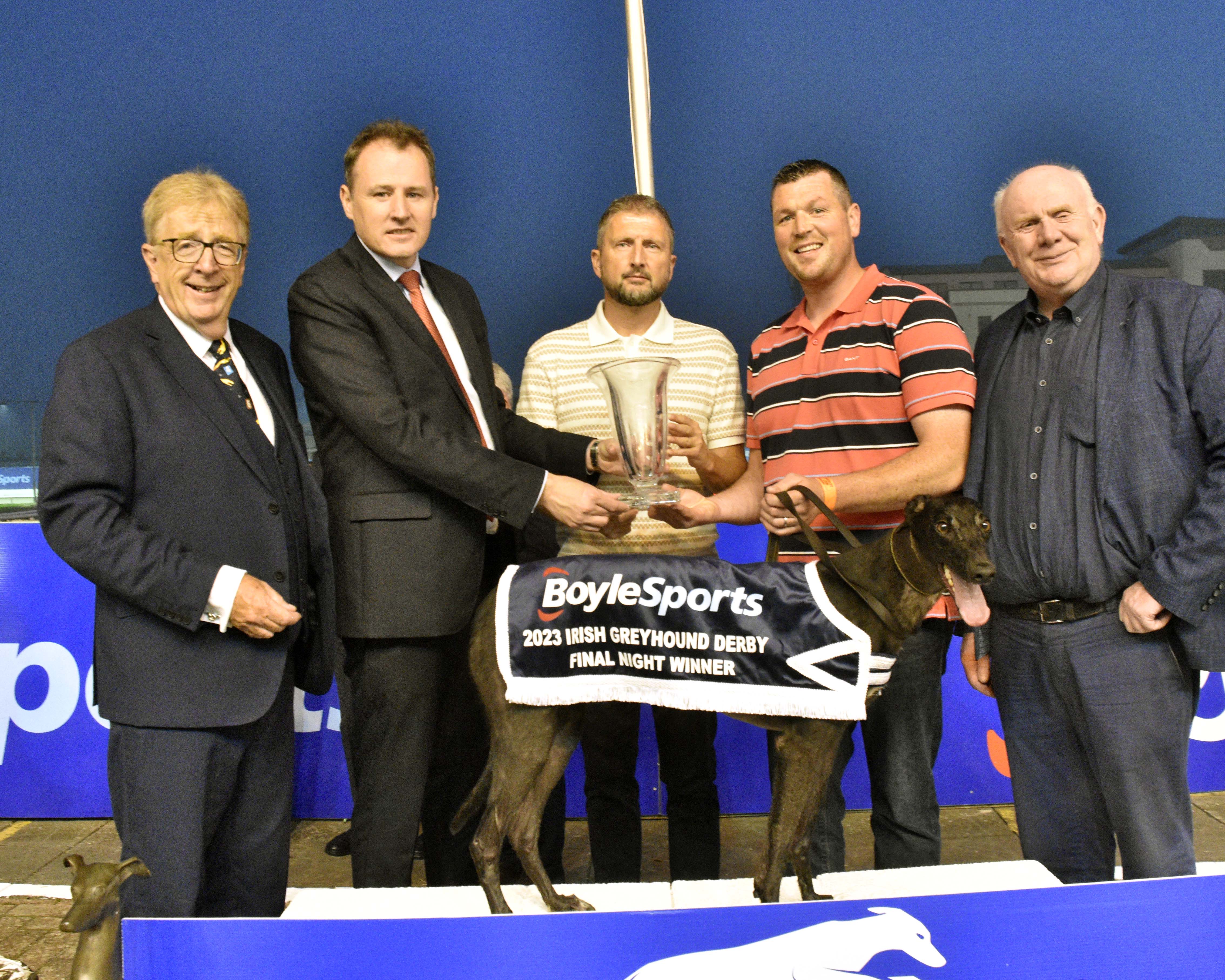 Minister for Agriculture Charlie McConalogue PresentsShane dowling after Ballymac Katie won the Irish Retired Greyhound Trust Open 750 also inc are Jackie Cahill TD and Frank Nyhan