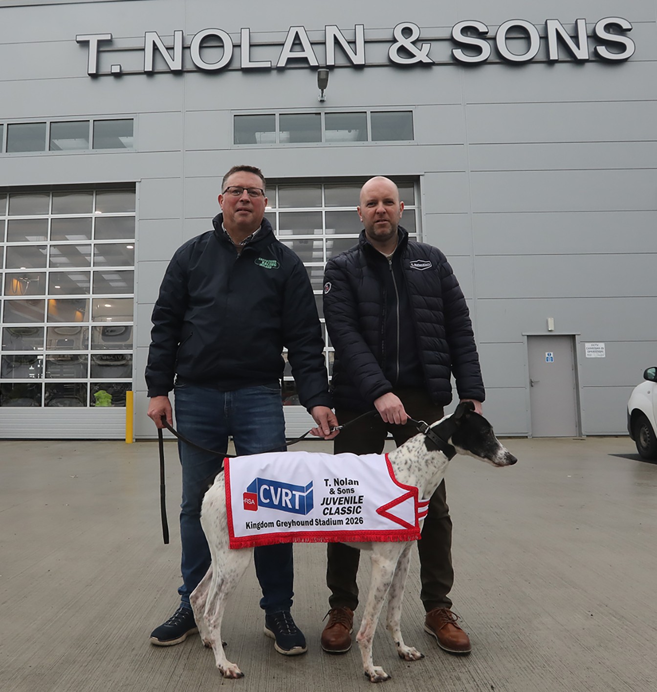 T Nolan CVRT Centre Juvenile Classic Launch Kieran Casey, Racing Manager at Kingdom Greyhound Stadium, with Paul Hynan, Sales Manager, T. Nolans and Sons, and their greyhound friend pictured at the new T.Nolans premises in Limerick to launch the sponsorship of the T. Nolan CVRT Centre Juvenile Classic which gets underway on Friday 13th February