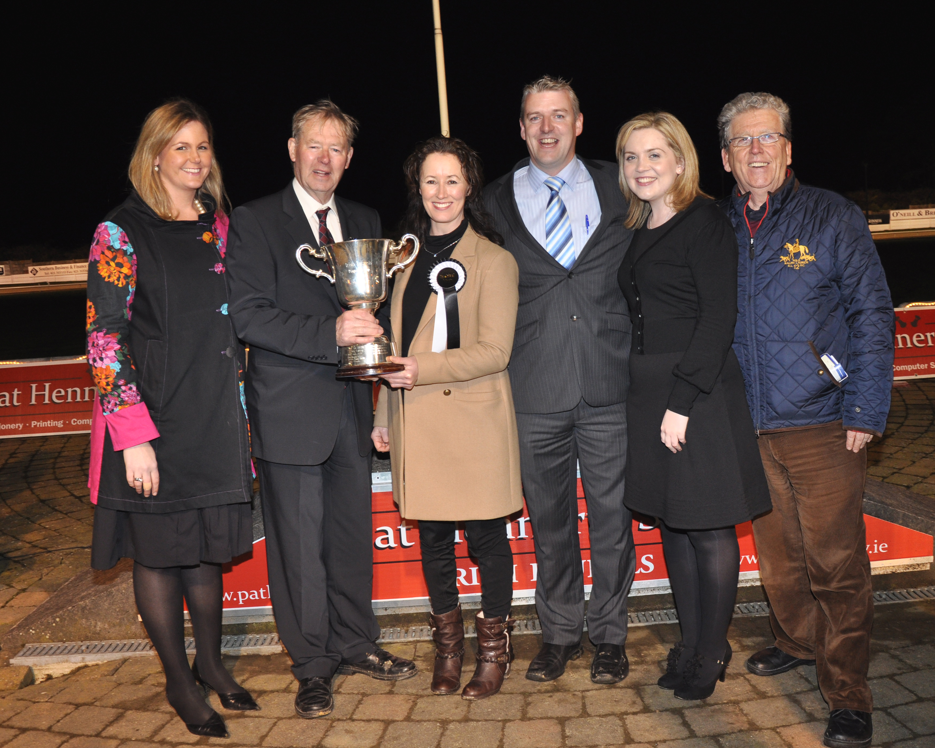 Michéal O' Muircheartaigh following his win in the Irish Laurels in Curraheen Park, pictured with Liz Igoe, Dolores Ruth, Brian Collins, Dawn Quinn & Liam Marks 