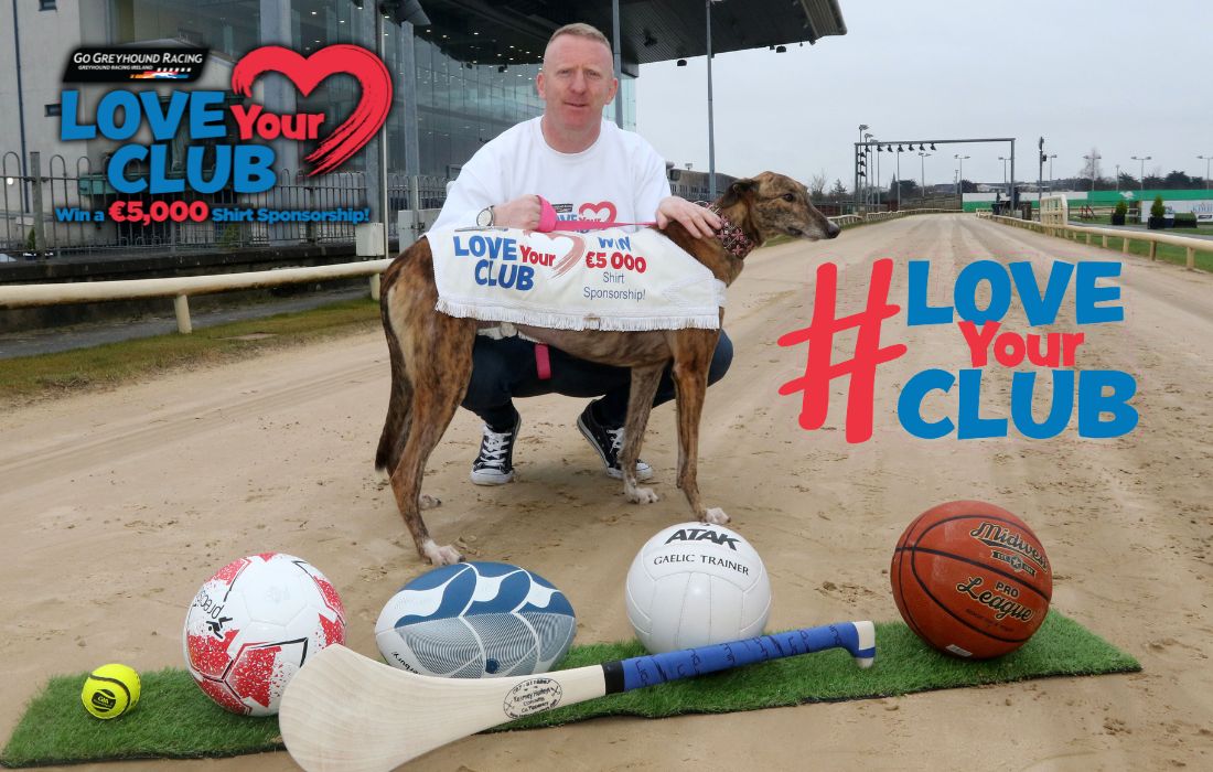 Picture shows a man and a greyhound, John Mullane and retired Greyhound Bridie, pictured on an Irish Greyhound Track with sports equipment to launch the Love Your Club Competition