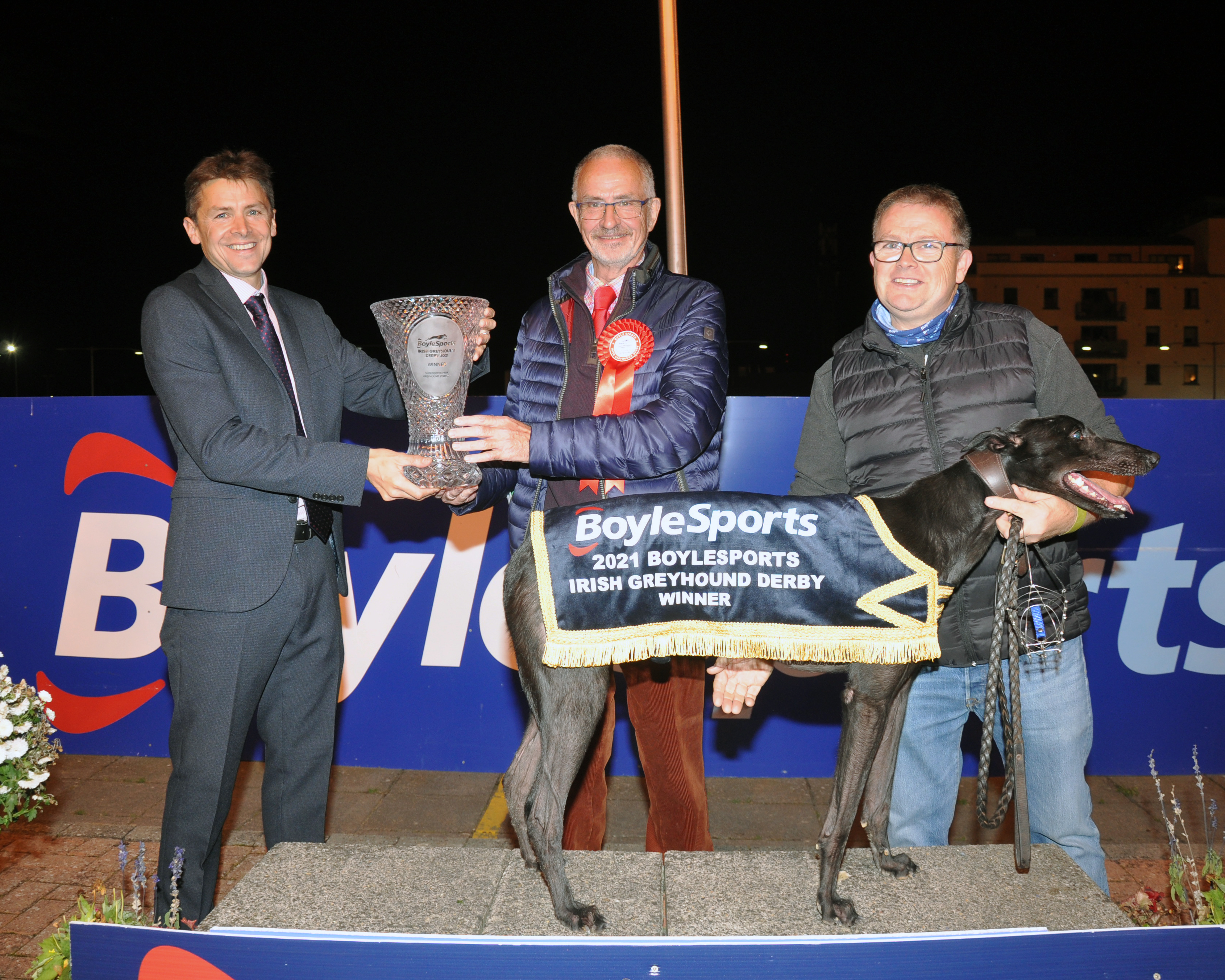 Presentation of Trophies Susie Sapphire won the Final 2021 BoyleSports Derby( L to  R ) Mark Kemp CEO BoyleSports (Sponsors) Peter Comerford (Owner) Owen Mc Kenna (Trainer) ,